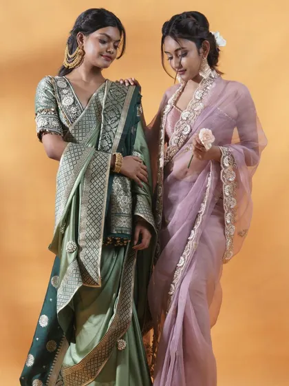 Here, I focused on the complementary colors and textures of two distinct sarees. The gentle interaction between the models adds a soft, narrative quality, demonstrating how different pieces in a collection can be styled together.