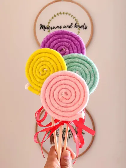 These macrame lollipops are a fun and whimsical ornament for Christmas or a cute party favor for a candy-themed birthday.