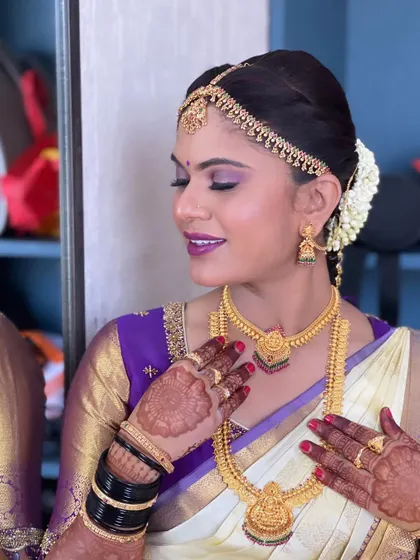 Another detailed shot of the makeup and henna, showing the beautiful coordination of colors and textures.