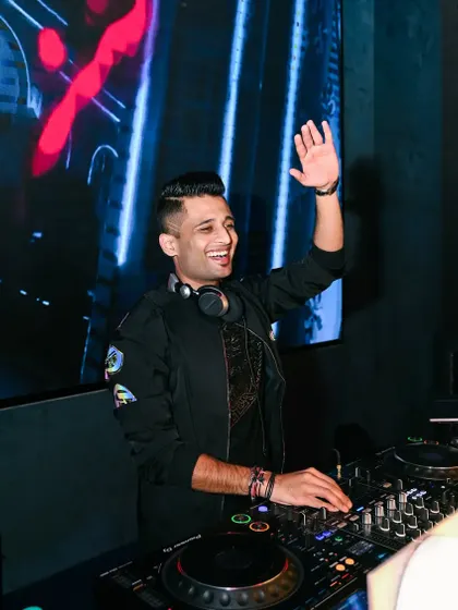 Waving to the crowd at Shimmers Raipur. I love traveling to different cities and connecting with new audiences through music.