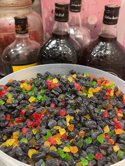 The heart of our Christmas cakes: a big bowl of fruits and nuts being soaked in rum. This is where all the festive flavour begins.