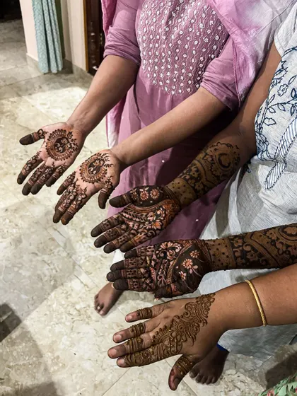 A collection of different guest mehendi styles, from Arabic vines to full-palm patterns, showcasing the range my team offers.