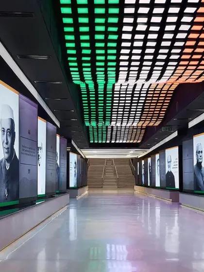 The interior of the museum, featuring a dynamic ceiling with lights representing the Indian flag. This space was designed to be immersive, using technology and architecture to tell a story.
