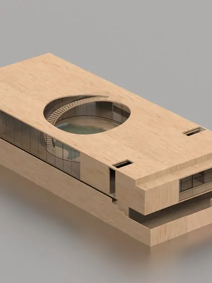 A wooden model of the Vastu compliant residence. This model helps us study the form and the relationship between the solid and void spaces, particularly the large circular opening in the roof that brings light down into the central courtyard.