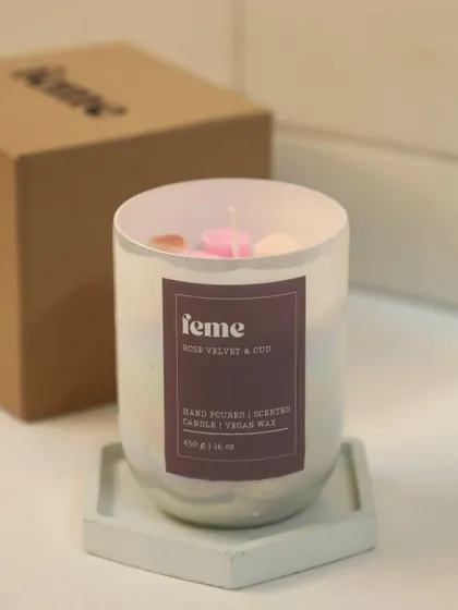 Our 'Rose Velvet & Oud' fragrance in the holographic jar. A deep, romantic, and luxurious scent.