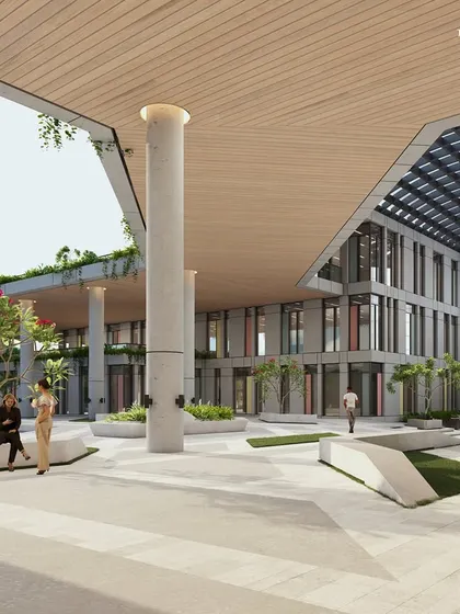 The central plaza of the Bharati Vidyapeeth campus, a bustling hub for students and faculty. The design features open spaces, integrated greenery, and a large screen on the convention center, creating a vibrant community gathering point.