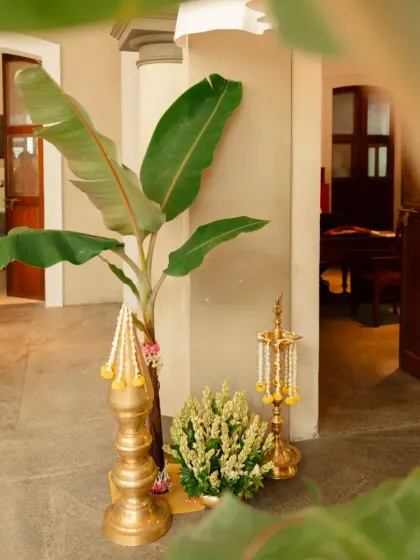 A fusion of cultures. For this North Indian couple who fell in love in Pondicherry, we designed a Haldi and Mehendi evening that blended traditional South Indian elements like banana leaves and brass lamps with vibrant floral decor.