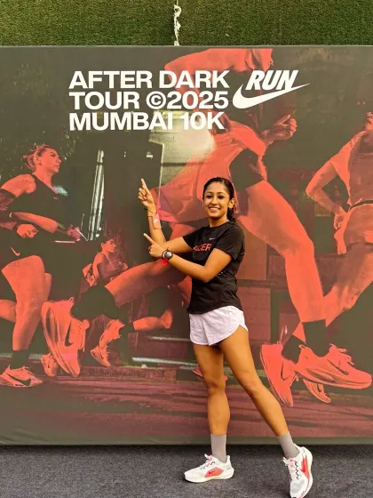 Pointing to the future at a Nike After Dark Run. These events are more than just a race; they are a celebration of our collective strength and passion for running.