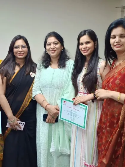 A group of us proudly holding our appreciation certificates. Moments like these celebrate the hard work we put in every day to promote better health outcomes.