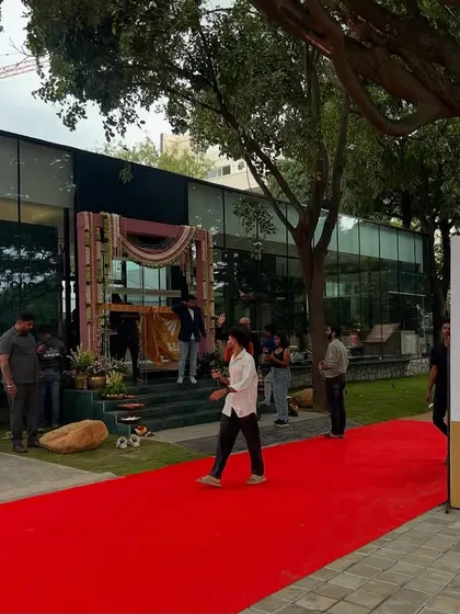 The opening of the VPG Experience Center, with legendary cricketer Sunil Gavaskar. The building is a steel "kit-of-parts" structure, presenting a crisp, rectilinear box to a major arterial road in Whitefield.