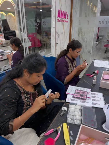 Students getting hands-on with nail extensions on the first day of our professional course.