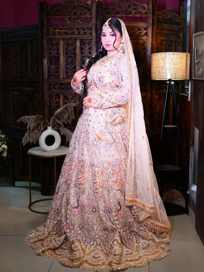 A full-length view of our magnificent pastel bridal lehenga, perfect for a day wedding or a grand reception.