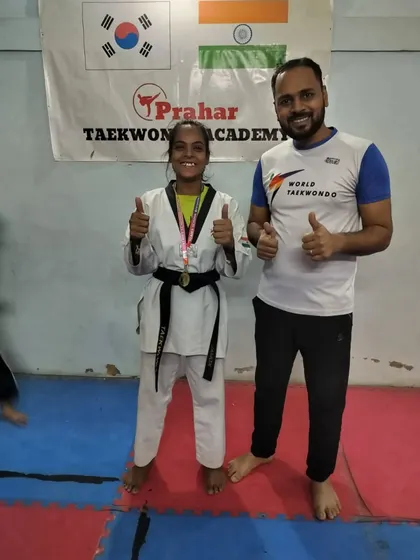 Thumbs up for a great performance from our black belt champion at the Stairs Outer District Championship.