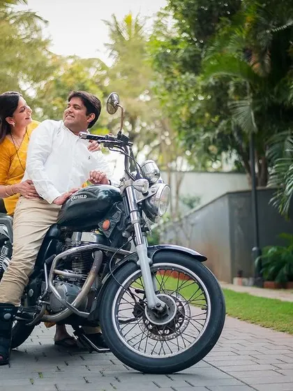 A casual and fun couple shoot on a motorcycle. We encourage couples to bring their personalities and hobbies into their photoshoots.