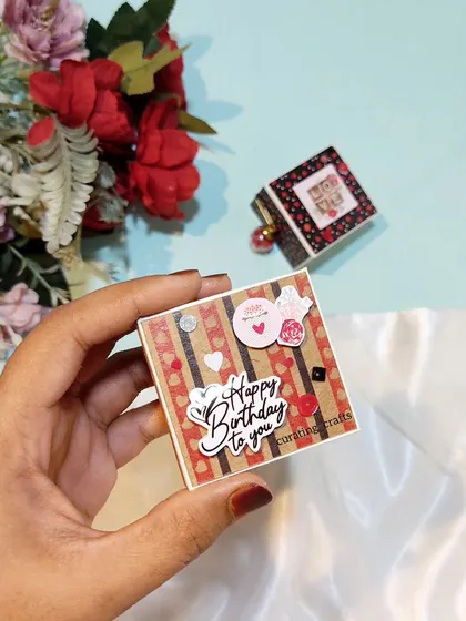 A tiny birthday-themed scrapbook, perfect as a small token of affection.