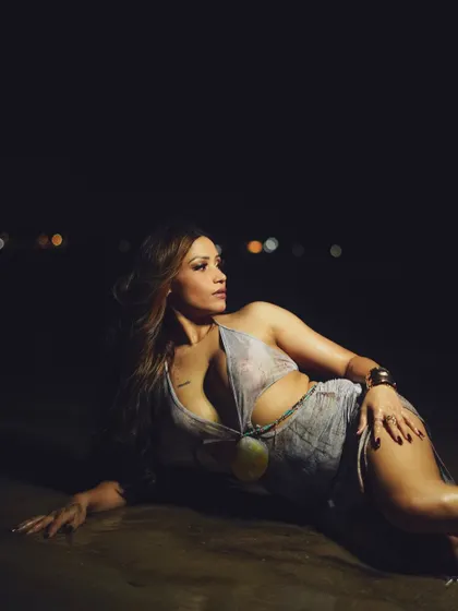 A dramatic night shoot on a Mumbai beach with model Alendra Bill. This photo demonstrates my technical skill in low-light conditions to create moody and captivating beachside glamour shots.