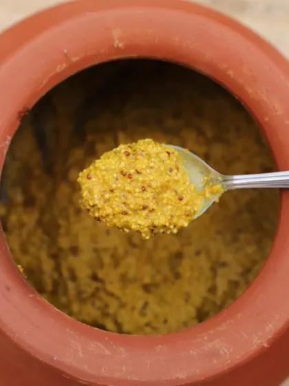 Our raw mango mustard chutney is a labor of love, slowly fermented to perfection just like in our grandparents' kitchens. It's more than a chutney; it's a versatile cooking paste.