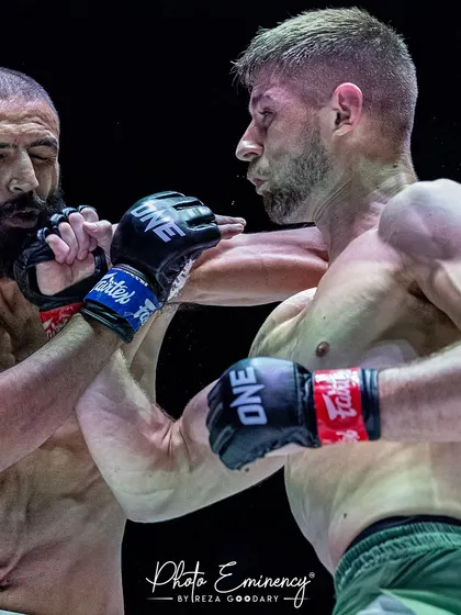 A close-up of the striking exchange during the ONE Championship bout in Bangkok. This highlights the precision and toughness required to compete at the elite level.