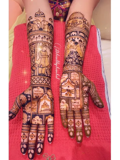 A different view of the bridal mehendi with wedding vows and couple portraits.