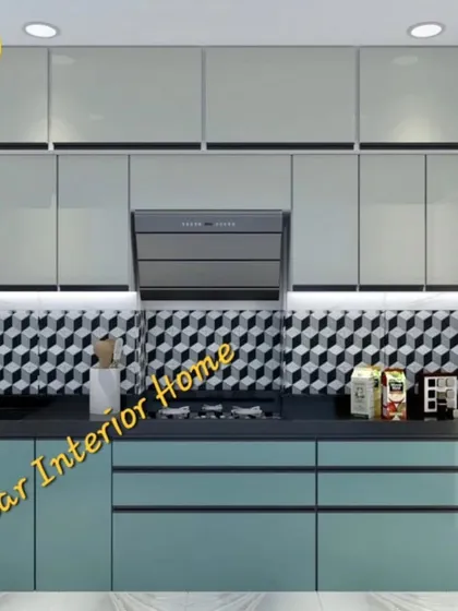 A front view of the cooking area in the geometric-themed kitchen, showing the chimney and hob setup.
