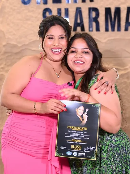 This moment is why I love teaching. Seeing my student's happiness as she receives her professional makeup artist certificate is the real reward. You could be next.