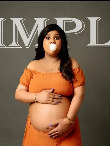 Let's have some fun! This playful shot with bubblegum adds a touch of humor and personality to the maternity session.