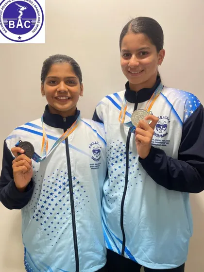 Shirin and Naisha with their impressive medal haul.