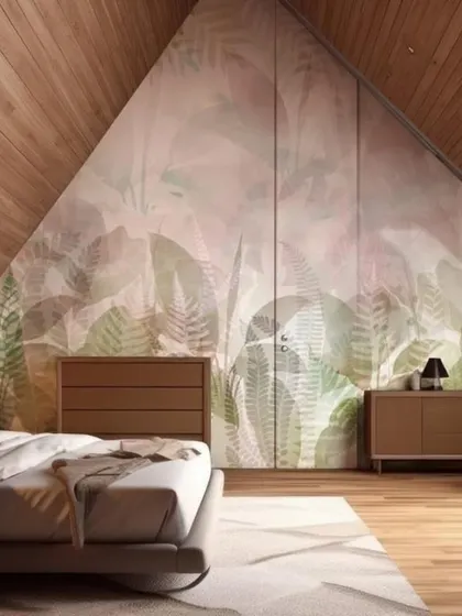 A pastel-toned botanical wallpaper applied to an angled wall and closet in an attic bedroom, showcasing how we can customize designs for unique architectural spaces.