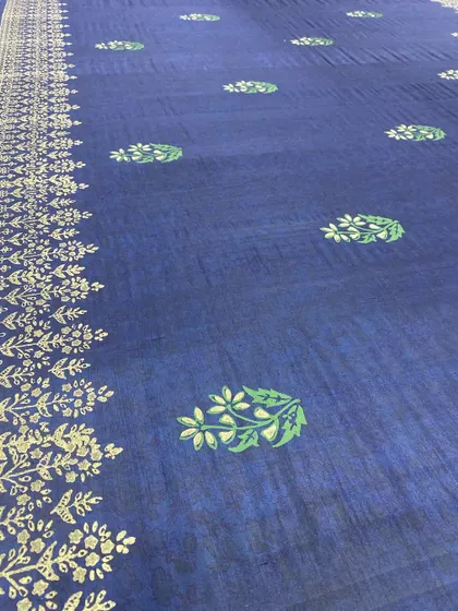 The final result of our hand-crafted block printing on a deep blue saree. The intricate floral border and butis add a big impact with a small, artistic move.
