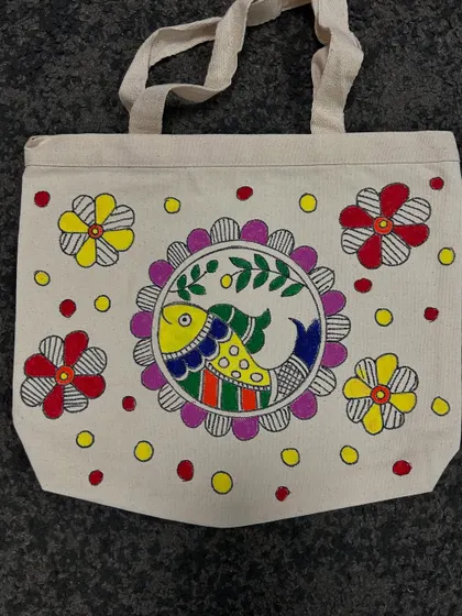 This student created a lovely composition with a fish inside a floral frame, all in the Madhubani style. The colours and patterns are just wonderful.