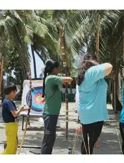 Students of different ages practicing together. Archery is a sport that bridges generations.