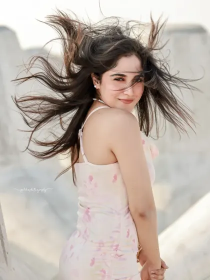 A series of carefree portraits of an actress on the beach. I captured the natural movement of her hair in the wind to create a sense of freedom and joy.