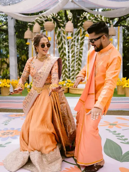 A fun and candid moment of the couple dancing. The makeup is designed to be long-lasting and flawless, even through all the fun and festivities.
