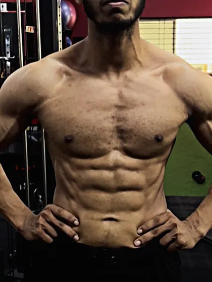 The front view of an 11-week transformation. The abdominal wall is tighter and more defined.
