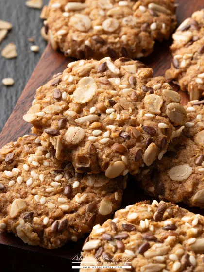 This is a macro shot focusing on the incredible texture of these multi-seed healthy cookies. Getting up close like this shows the quality of the ingredients and the satisfying crunch.