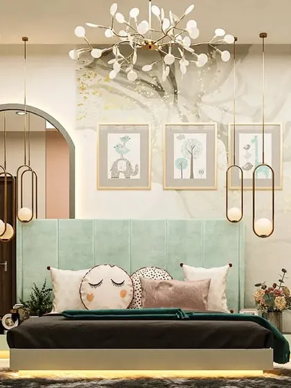 This guest or kids' room features a calming mint green headboard and playful pillows. The marble-effect wallpaper with gold accents and modern pendant lights adds a touch of sophistication to the space.