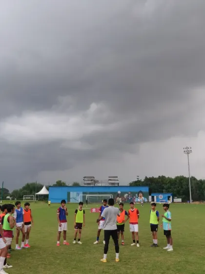 A training session under dramatic cloudy skies. Our players are dedicated and train in all conditions.