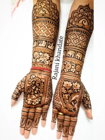 Another view of the intricate full-arm bridal design, showcasing the beautiful flow of patterns from the palm to the elbow.