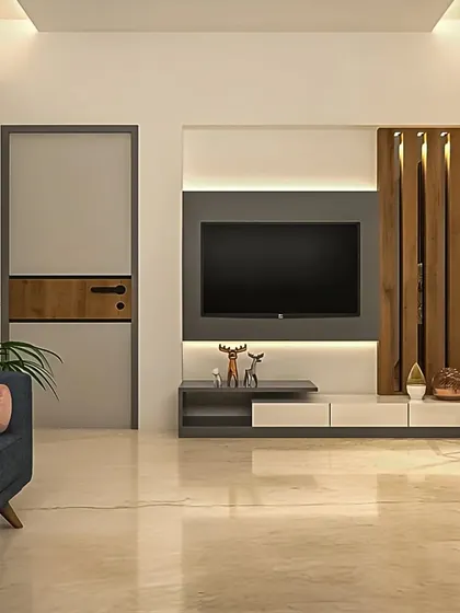 A well-balanced living room design featuring a TV unit with both closed and open storage. The wood slat detail adds a touch of warmth and texture.