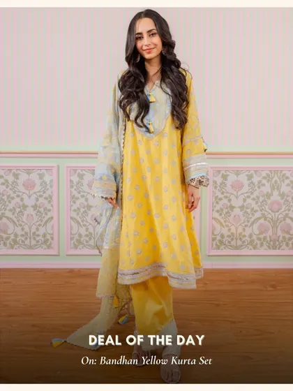 The Bandhan Yellow Kurta Set is a cheerful and bright option for a daytime event. The light blue dupatta adds a lovely contrast.