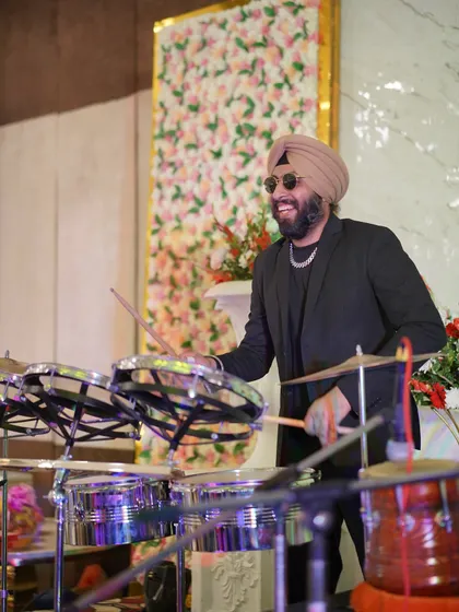 Enjoying the moment while playing the roto toms. My diverse instrument setup allows me to adapt to any style of music.