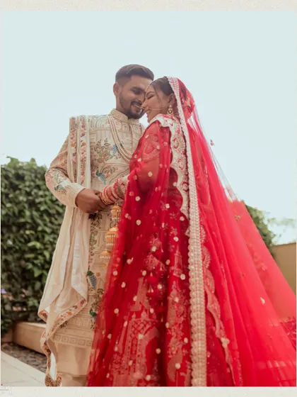 A happy and intimate wedding day portrait of the couple, capturing their joyful connection.
