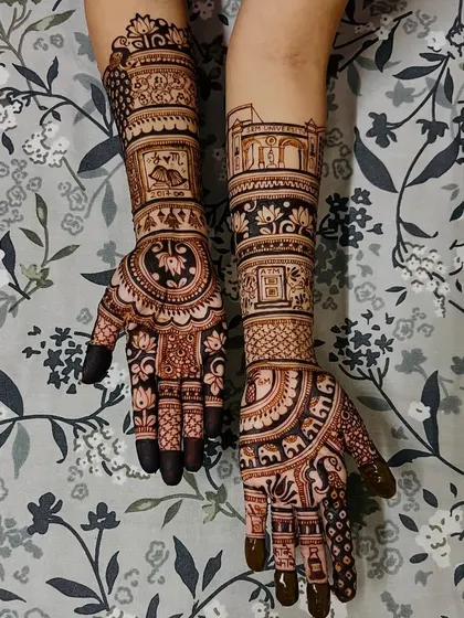 Another view of the personalized story mehendi, showing different panels with unique figures and motifs that tell the bride's personal story.