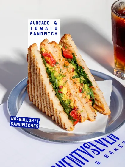 A fresh and light option, my Avocado & Tomato Sandwich is made with creamy avocado, fresh tomatoes, and a zesty dressing on toasted bread.