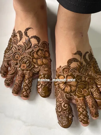 Another angle of the fresh foot mehendi, showing the detailed work on the toes and the top of the foot.
