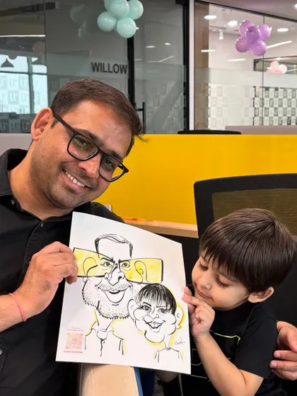 Even the little ones get in on the fun at corporate family days. This father-son caricature is a heartwarming keepsake.