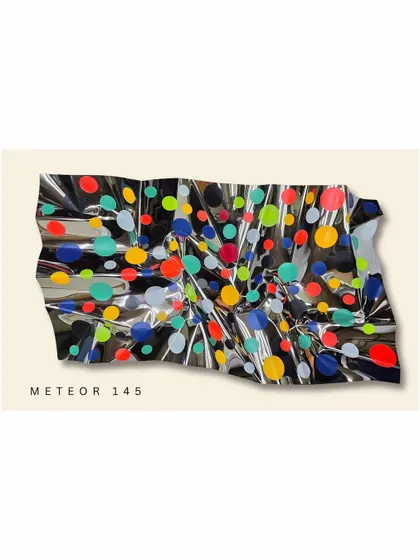 From my Meteor series, this wall installation explores energy and joy. The reflective, crumpled steel surface is scattered with vibrant polka dots, creating a playful and dynamic piece that interacts with the light in the room.