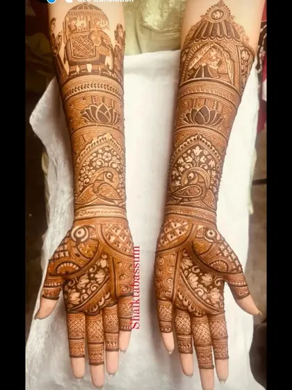 A stunning design that highlights the beauty of traditional Indian motifs. It features a grand elephant procession, blooming lotuses, and graceful peacocks, all woven together with intricate patterns.