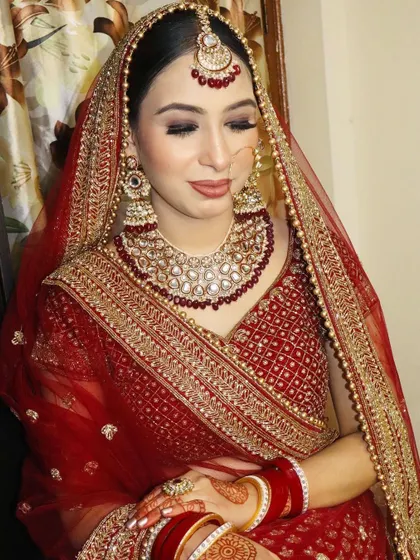 A beautiful shot of the bride with her eyes closed, showcasing the detailed eyeshadow work. Learning to blend multiple shades seamlessly is a core skill I teach in my self-makeup and professional courses.