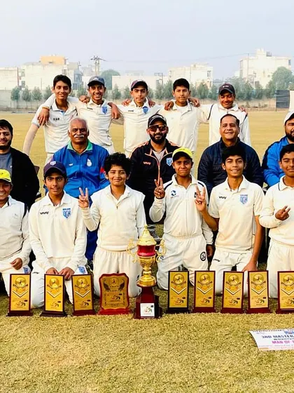 The complete U-14 championship squad with their parents and coaches. It takes a village to raise a champion, and our DCH family is proof of that.
